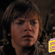 A young man, looking worried.